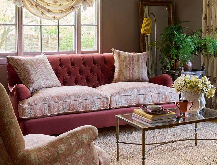 Chiddingfold 3 Seater Sofa in Omega Tawny Velvet and V&A Threads of India Regal Arabesque Flame with scatters in Sulawesi Splendour Jasper